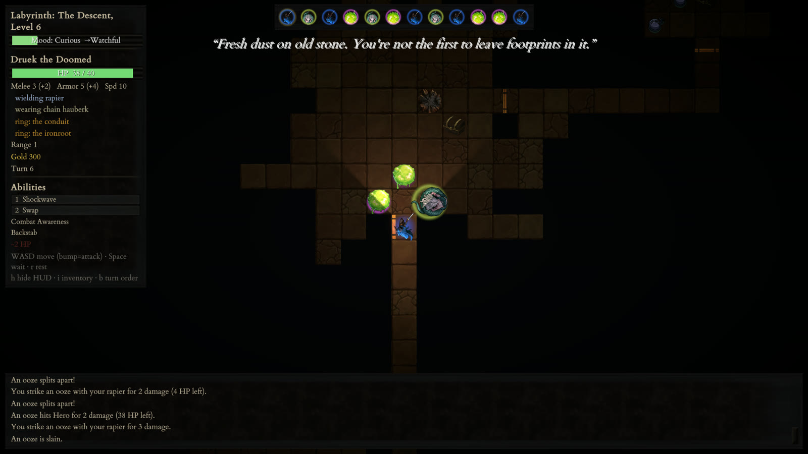Gameplay on depth 6, the caverns: bright green oozes splitting apart beside a crocodile as the hero fights from a doorway